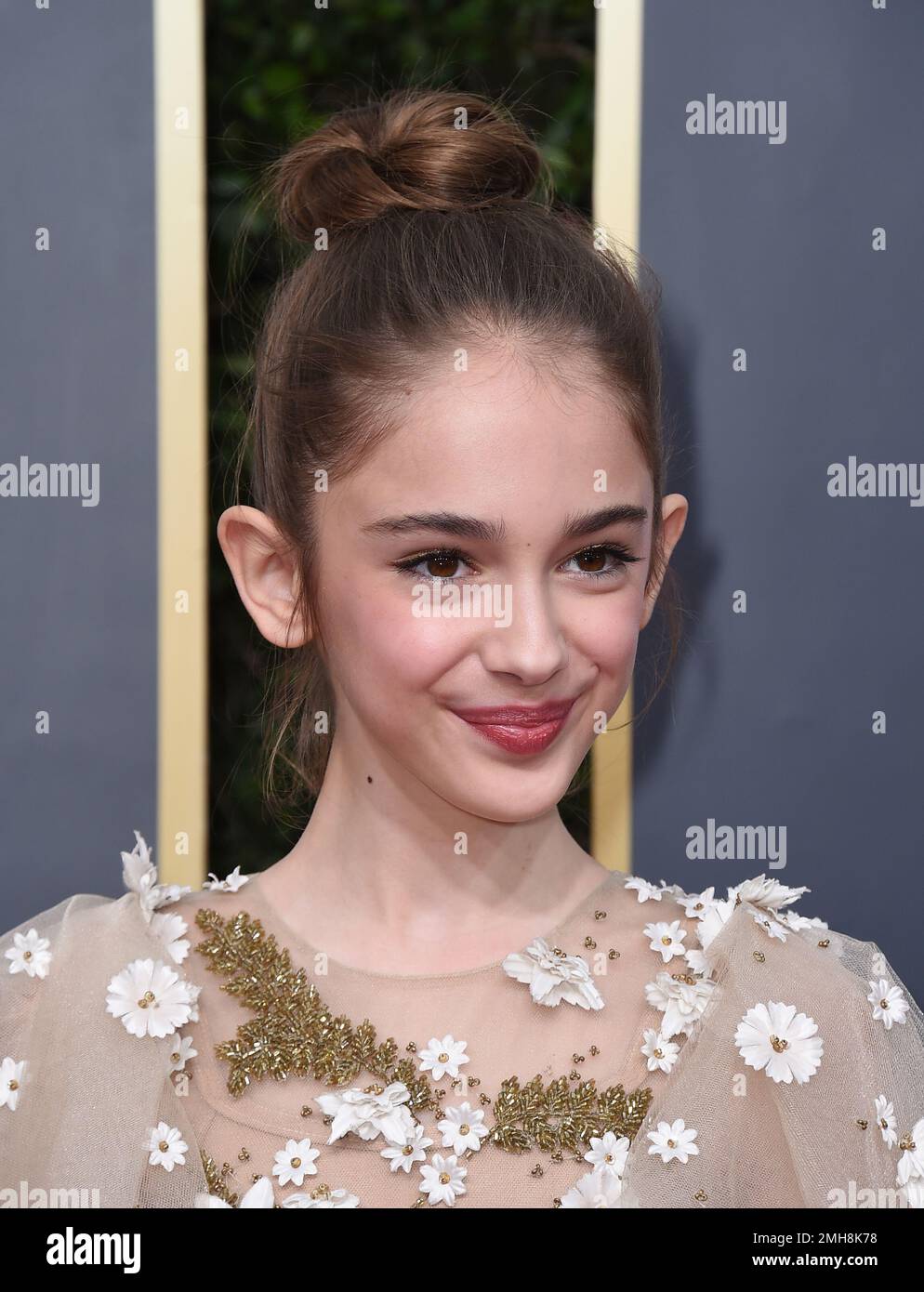 Julia Butters arrives at the 77th annual Golden Globe Awards at the