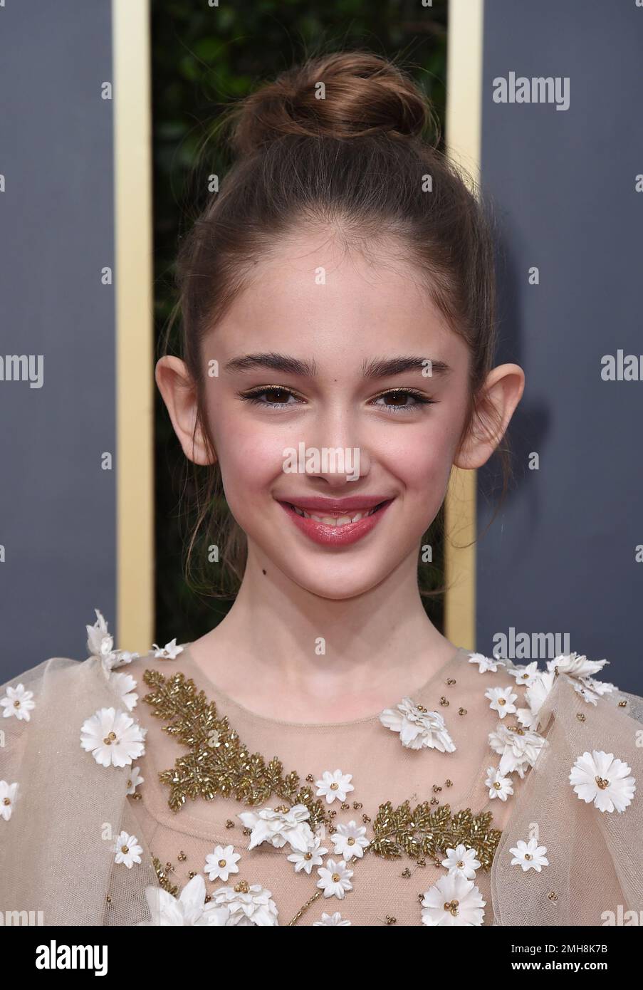 Julia Butters arrives at the 77th annual Golden Globe Awards at the