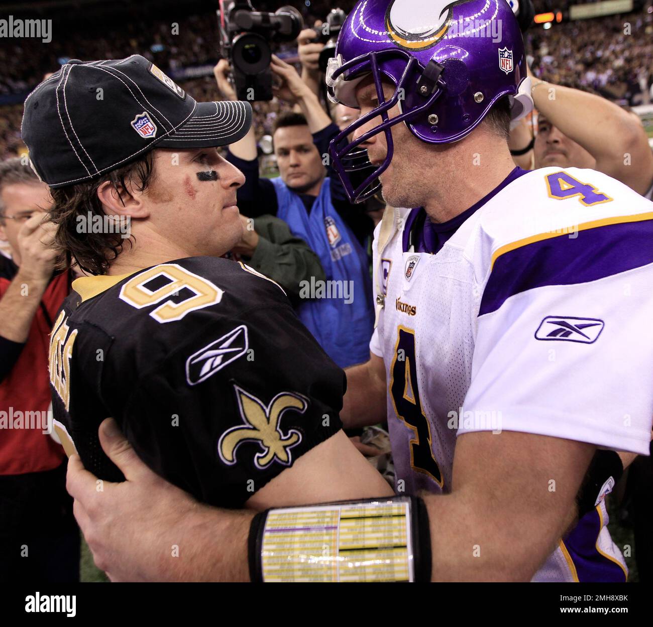 24 January 2010: Saints quarterback Drew Brees (9) holds up the