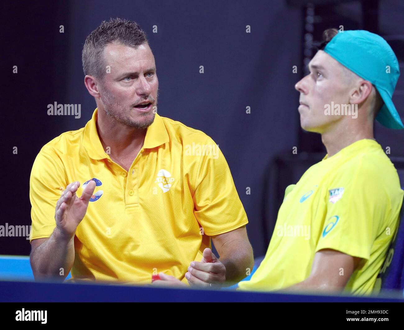 Australian team captain Lleyton Hewitt, left, talks to Alex de Minaur of Australia during his Australian team captain Lleyton Hewitt, left, talks to Alex de Minaur of Australia during his