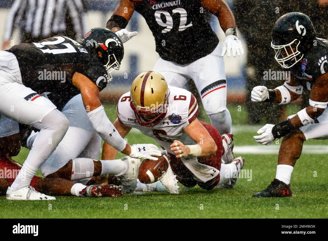 Boston College quarterback Dennis Grosel (6) recovers a fumble as
