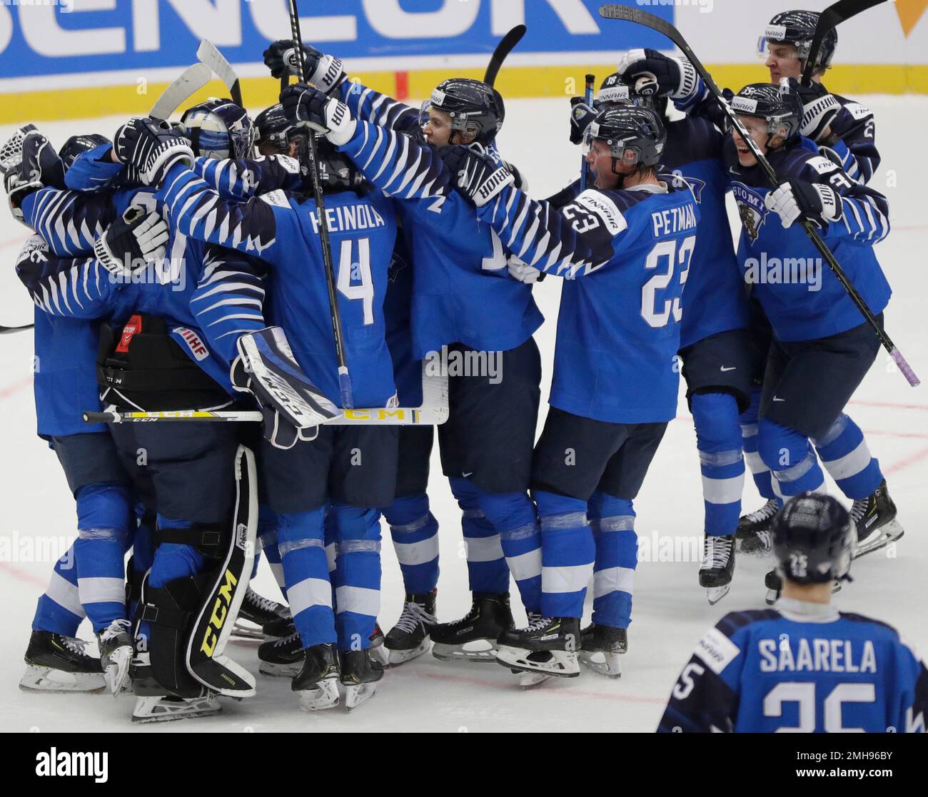 Players of Finland celebrate after winning the U20 Ice Hockey Worlds quarterfinal match between Finland and the United States in Trinec, Czech Republic, Thursday, Jan
