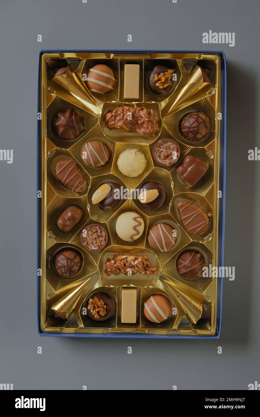 chocolate candies on a gray background. Chocolate box.Milk chocolate