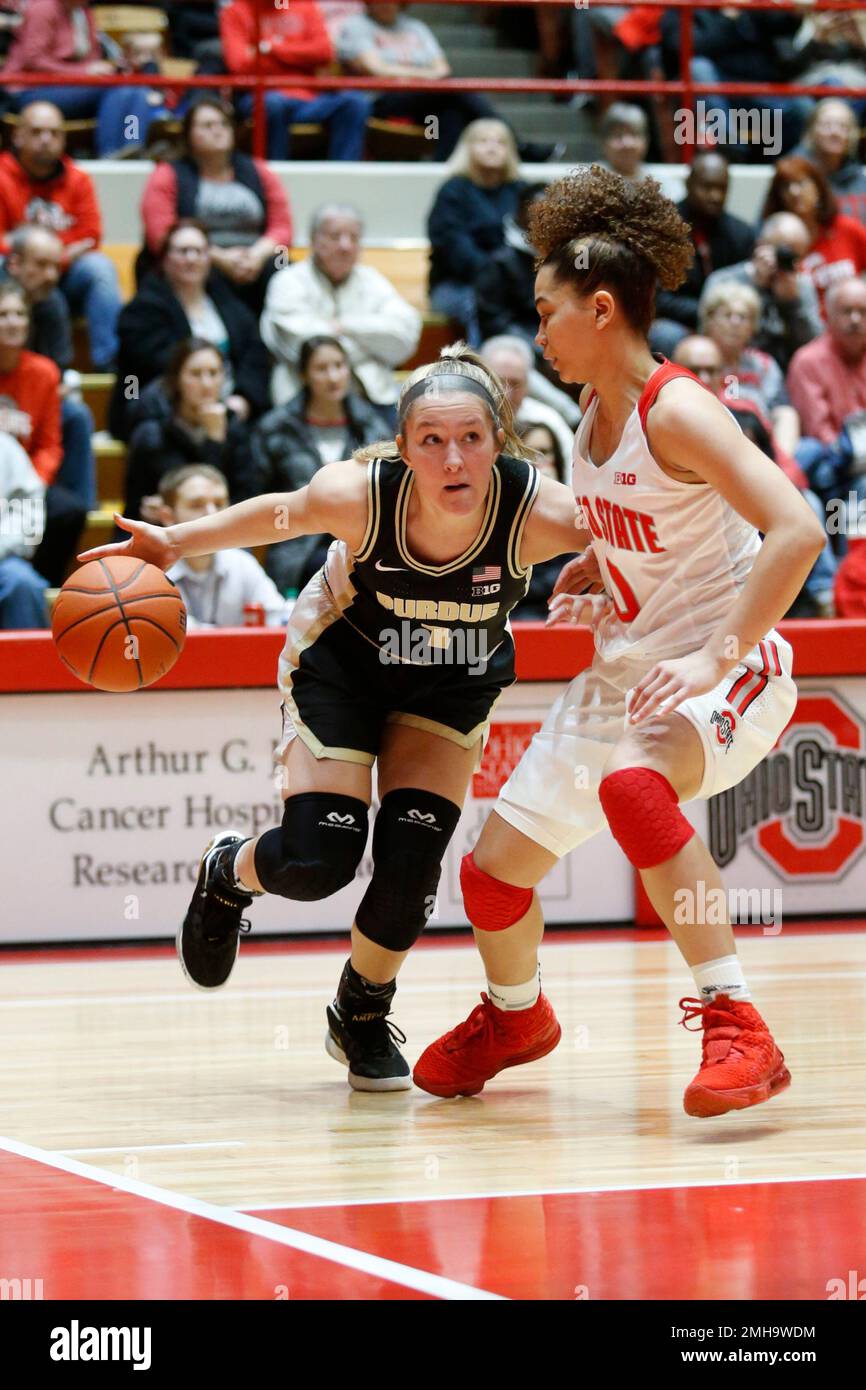Purdue guard Karissa McLaughlin, left, drives in front of Ohio State