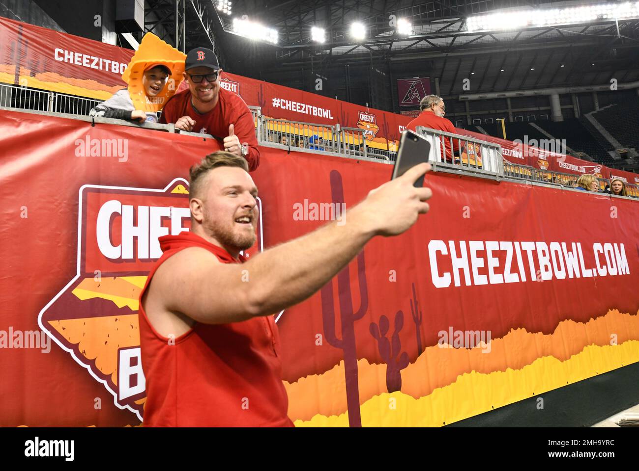 IMAGE DISTRIBUTED FOR CHEEZIT A young fan poses for a selfie with