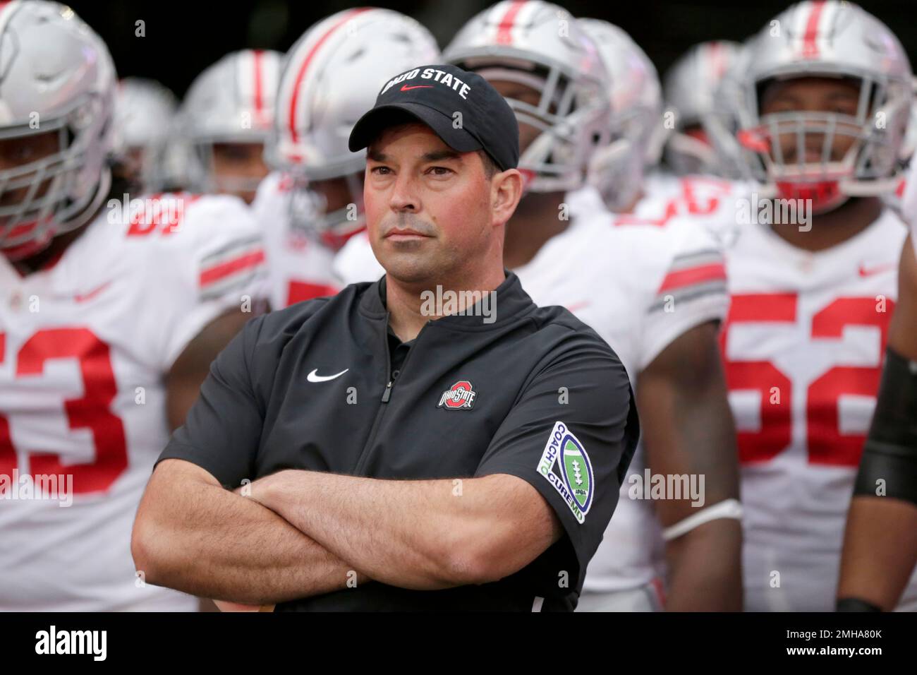 FILE - In this Sept. 28, 2019, file photo, Ohio State head coach Ryan Day  waits with his players before taking the field for an NCAA college football  game against Nebraska, in