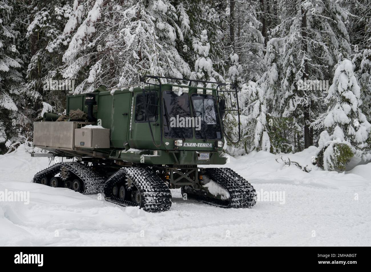 Cusick, United States. 25th Jan, 2023. A U.S. Air Force Tucker Sno-Cat snow vehicle with the 22nd Training Squadron, takes part in Survival, Evasion, Resistance, and Escape training for aircrews training under winter conditions, January 25, 2023 in Cusick, Washington. Credit: A1C Stassney Davis/U.S Air Force/Alamy Live News Stock Photo