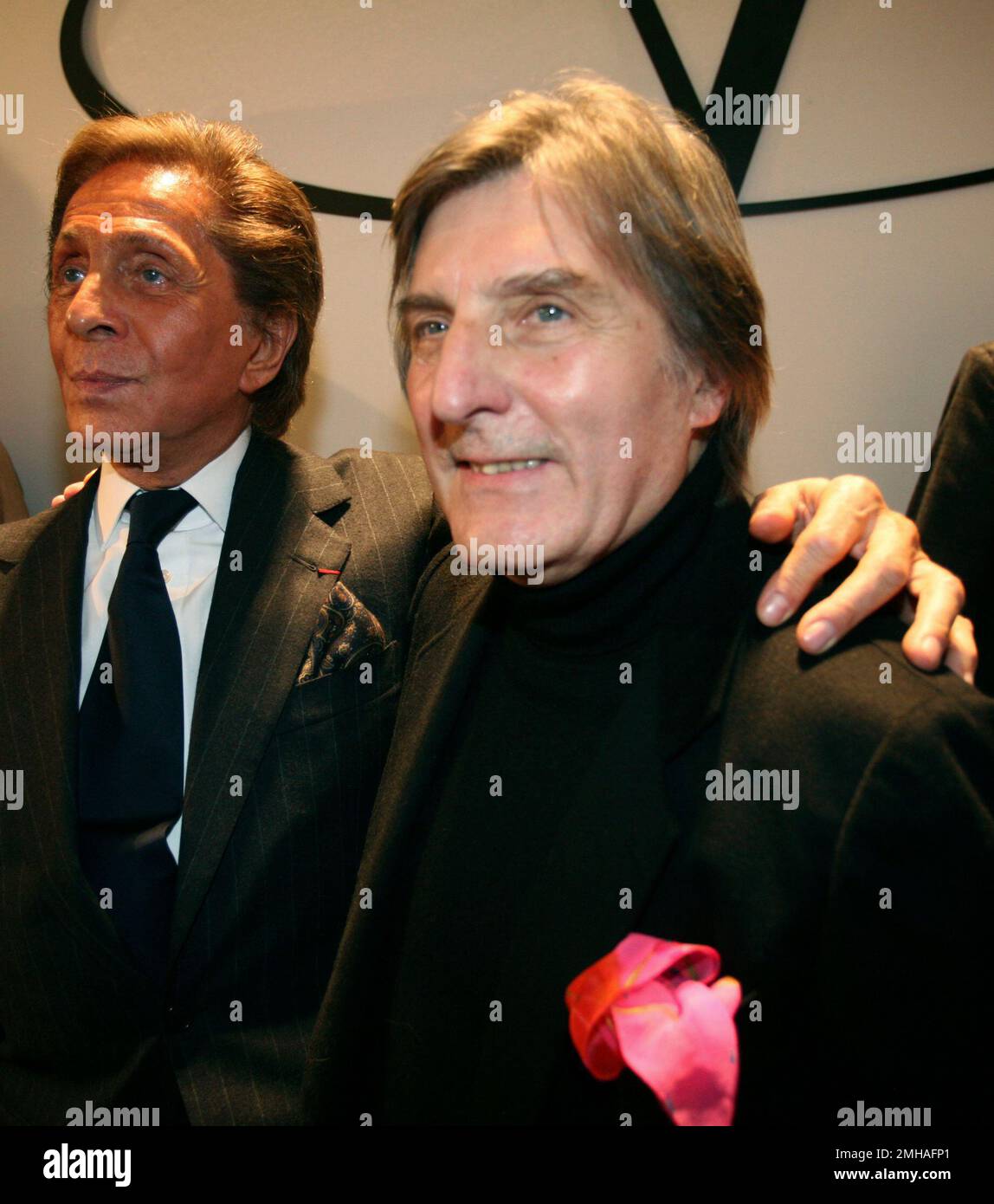fashion designer left, appears French designer Emmanuel Ungaro after the presentation of his Couture Spring-Summer 2008 collection, in Paris on Jan. 23, 2008. Ungaro, renowned for his use