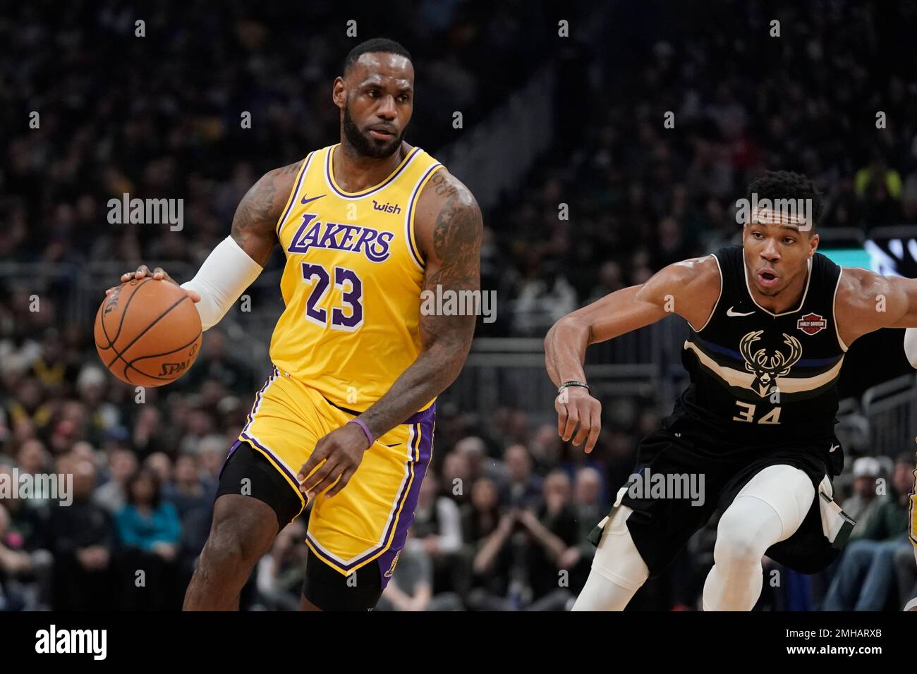 Los Angeles Lakers LeBron James dribbles past Milwaukee Bucks Giannis Antetokounmpo during the first half of an NBA basketball game Thursday Dec. 19 2019 in Milwaukee. AP Photo Morry Gash Stock Photo ...