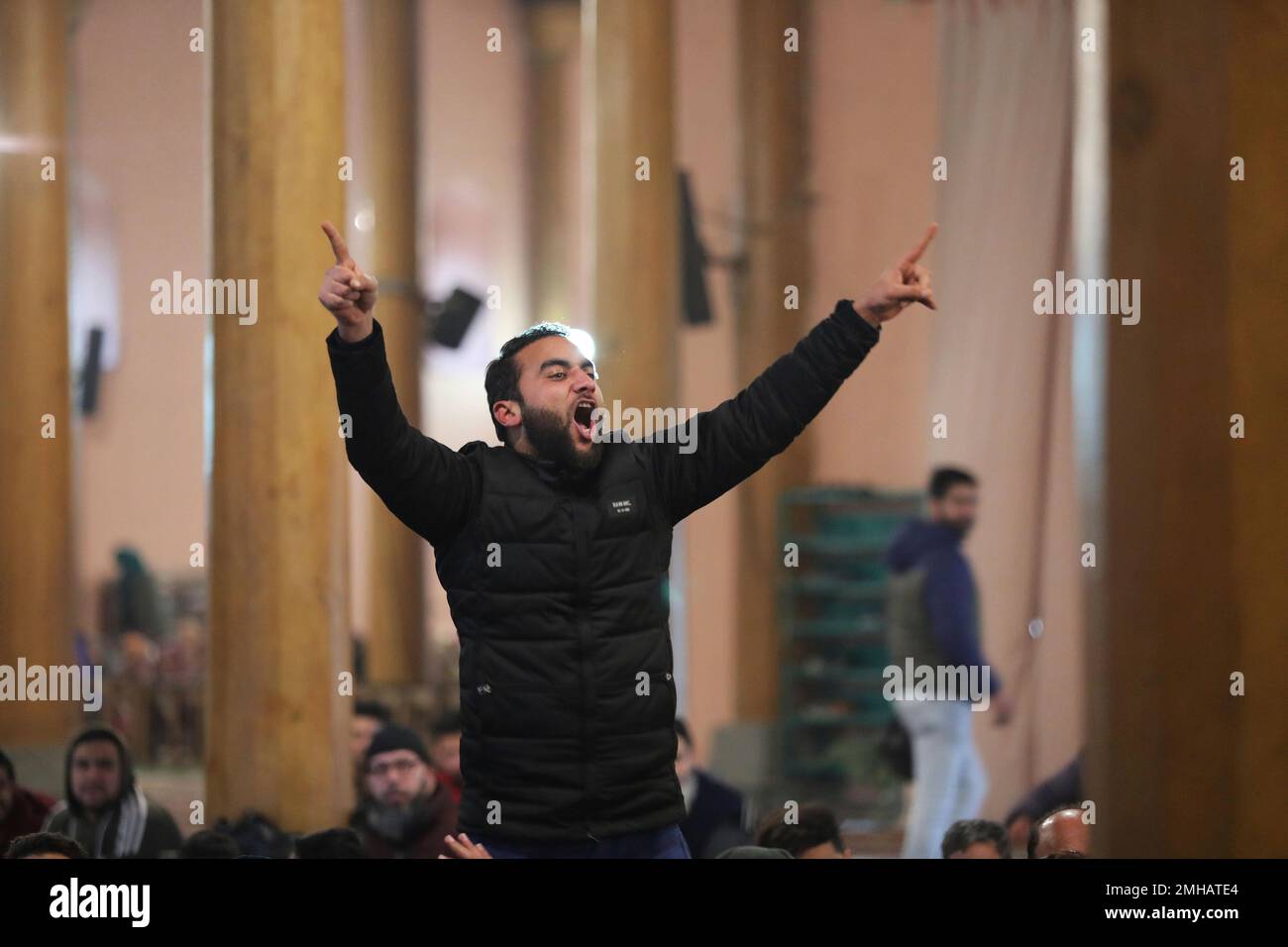 A Kashmiri man shouts freedom slogans as he arrives at Jamia Masjid ...