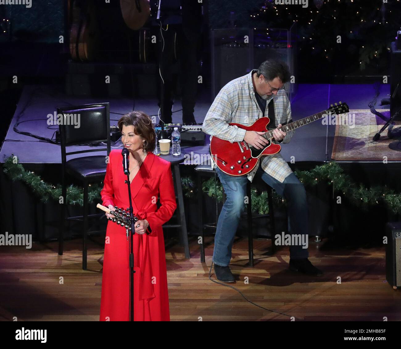 Amy Grant, left, and Vince Gill perform at Christmas at the Ryman at