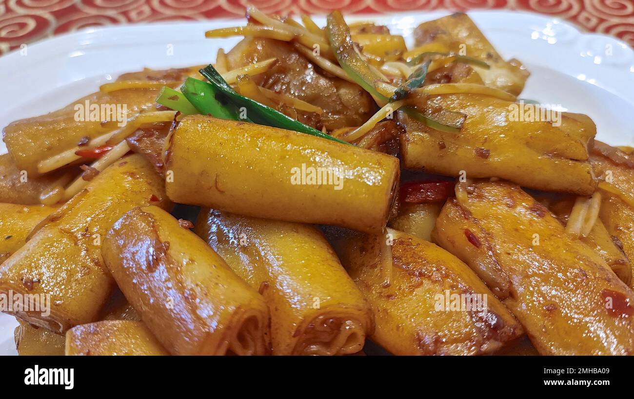 Steamed rice noodles with green onion and sauce, Chinese cuisine Stock Photo Alamy