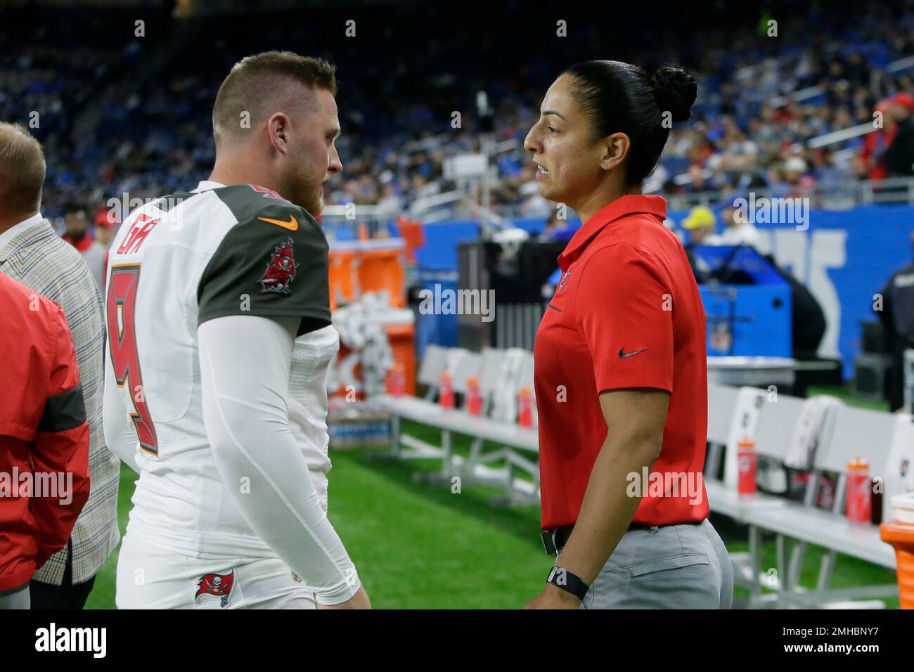 Tampa Bay Buccaneers assistant strength and conditioning coach Maral  Javadifar talks with kicker Matt Gay (9) during the first half of an NFL  football game against the Detroit Lions, Sunday, Dec. 15