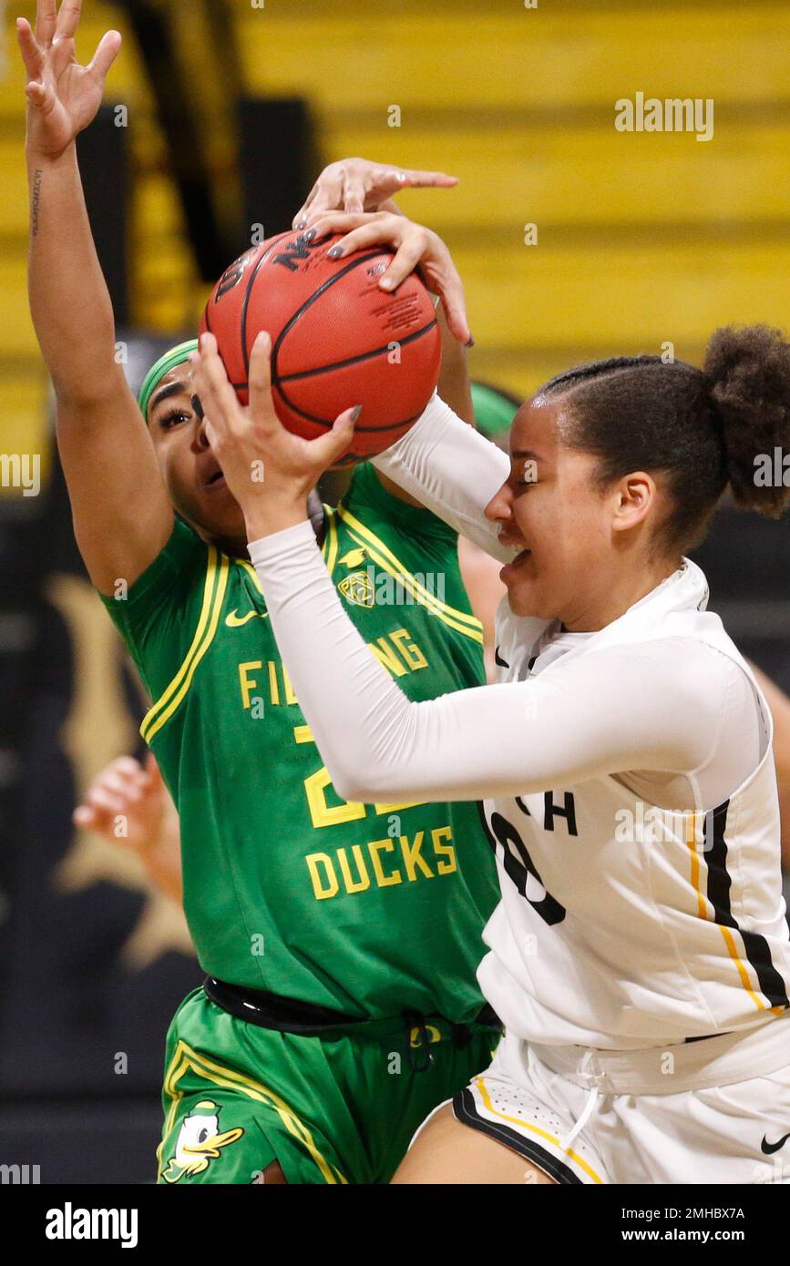 Long Beach State's Justina King (10) and Oregon's Minton Moore (23) fight  for a ball in an NCAA women's college basketball game between Long Beach  State and Oregon, Saturday, Dec. 14, 2094