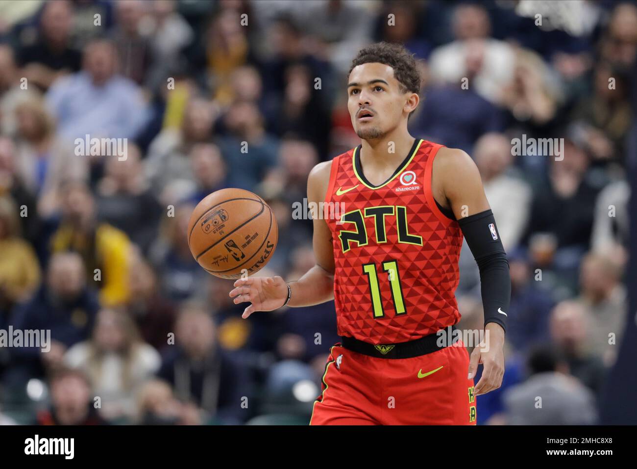 Atlanta Hawks' Trae Young (11) dribbles during the first half of an NBA ...