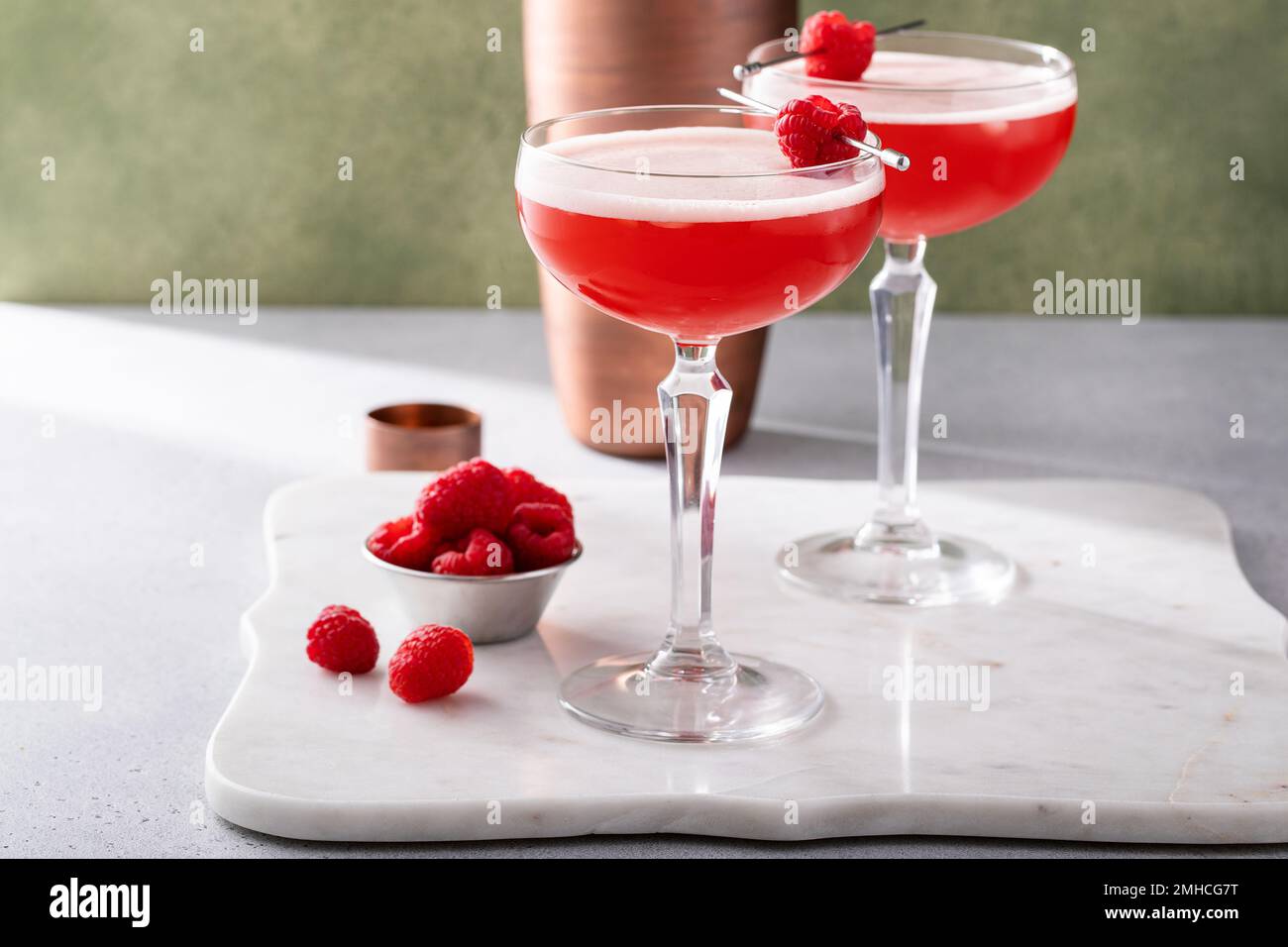 Raspberry martini cocktail with vodka, juice and raspberry liqueur Stock Photo