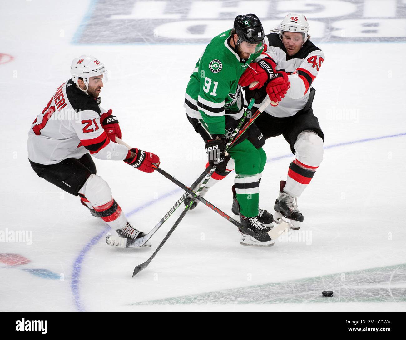 New Jersey Devils right wing Kyle Palmieri skates to the puck