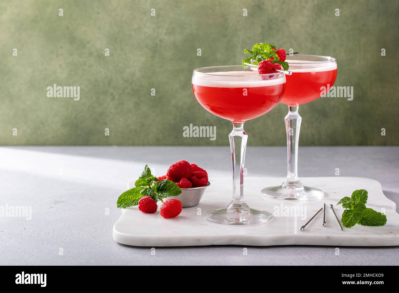 Raspberry martini cocktail with vodka, juice and raspberry liqueur