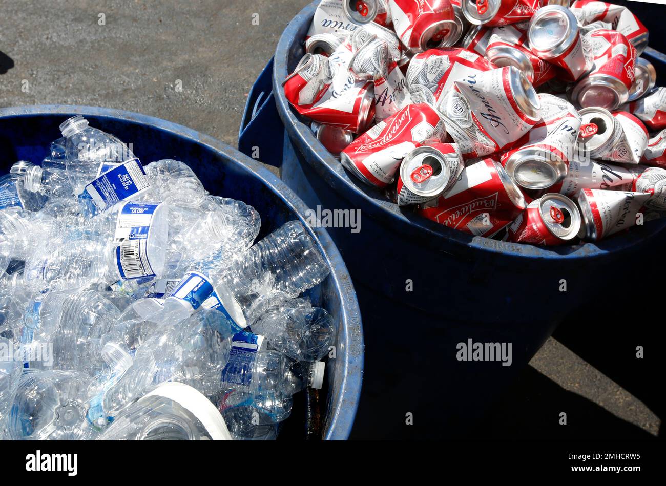 FILE In this July 5, 2016, file photo, cans and plastic bottles