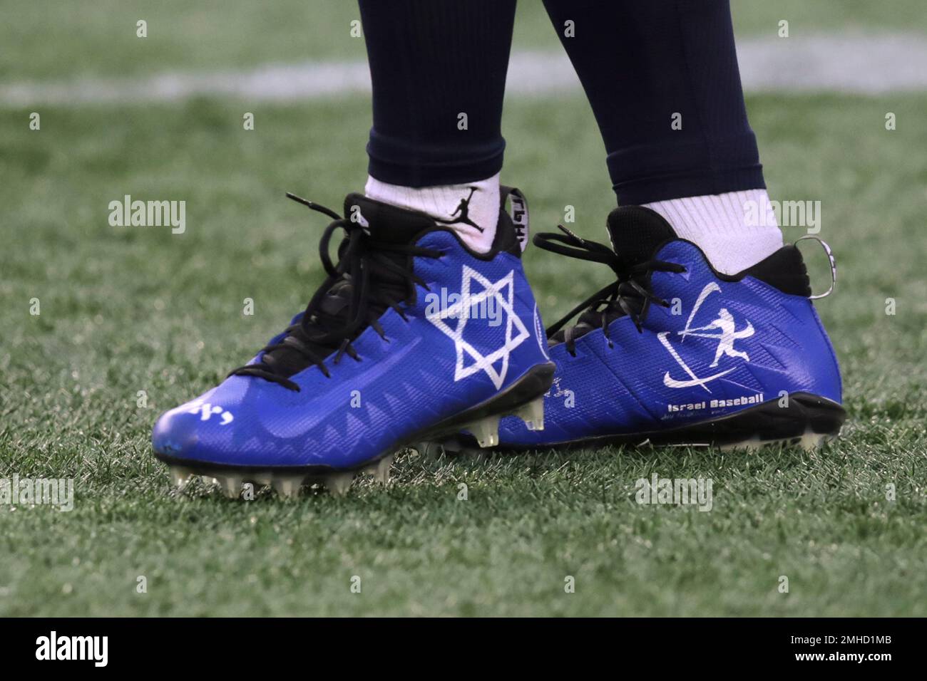 New England Patriots wide receiver Julian Edelman wears special shoes as part of the My Cause My Cleats campaign as he warms up before an NFL football game against the Kansas City