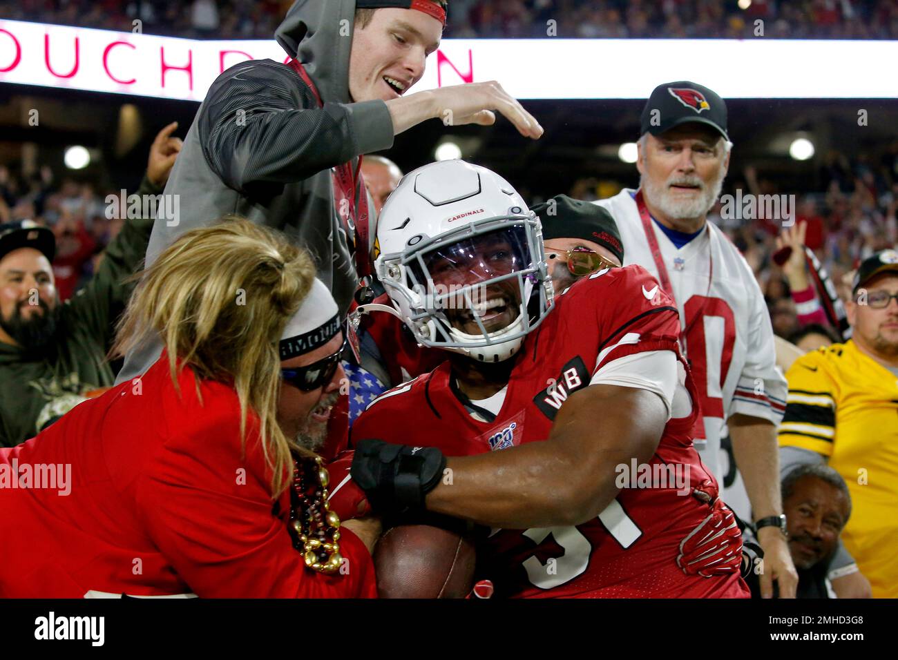 Arizona Cardinals running back David Johnson (31) wears custom cleats prior  to an NFL football game against the Pittsburgh Steelers, Sunday, Dec. 8,  2019, in Glendale, Ariz. (AP Photo/Ross D. Franklin Stock