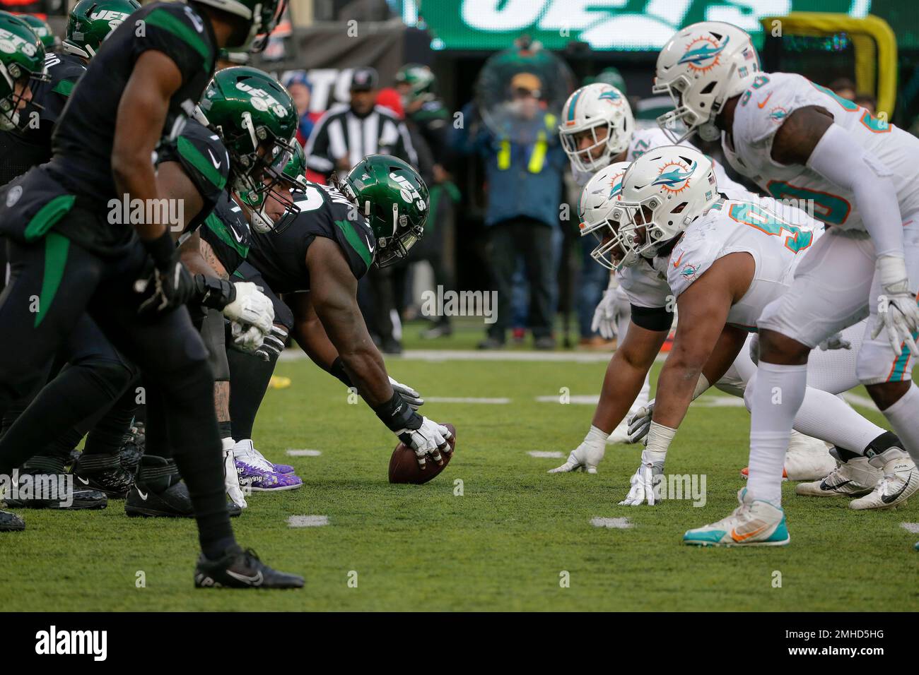 The New York Jets and Miami Dolphins line up at the line of scrimmage  during the third quarter of an NFL football game, Sunday, Dec. 8, 2019, in  East Rutherford, N.J. (AP