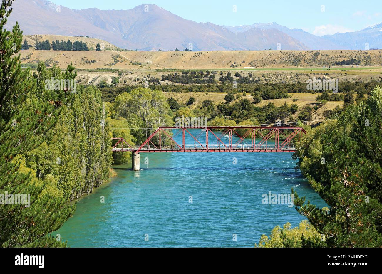 The red bridge across Clutha River - New Zealand Stock Photo