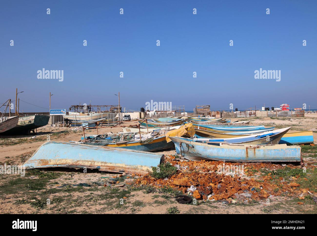 Gaza, Palestine. 26th Jan, 2023. A general view of damaged fishing boats at the beach, near the so-called 'Boat Graveyard'. In the last week, permitted the import of 12 outboard engines, said the United Nations. Israel had previously barred their entry based on concern they could prove 'dual use'. The repairs are taking place at an U.N.-supervised workshop on the beach, near the so-called 'Boat Graveyard' where dozens of rusty vessels have been piled up, abandoned after breakdowns. (Photo by Ahmed Zakot/SOPA Images/Sipa USA) Credit: Sipa USA/Alamy Live News Stock Photo