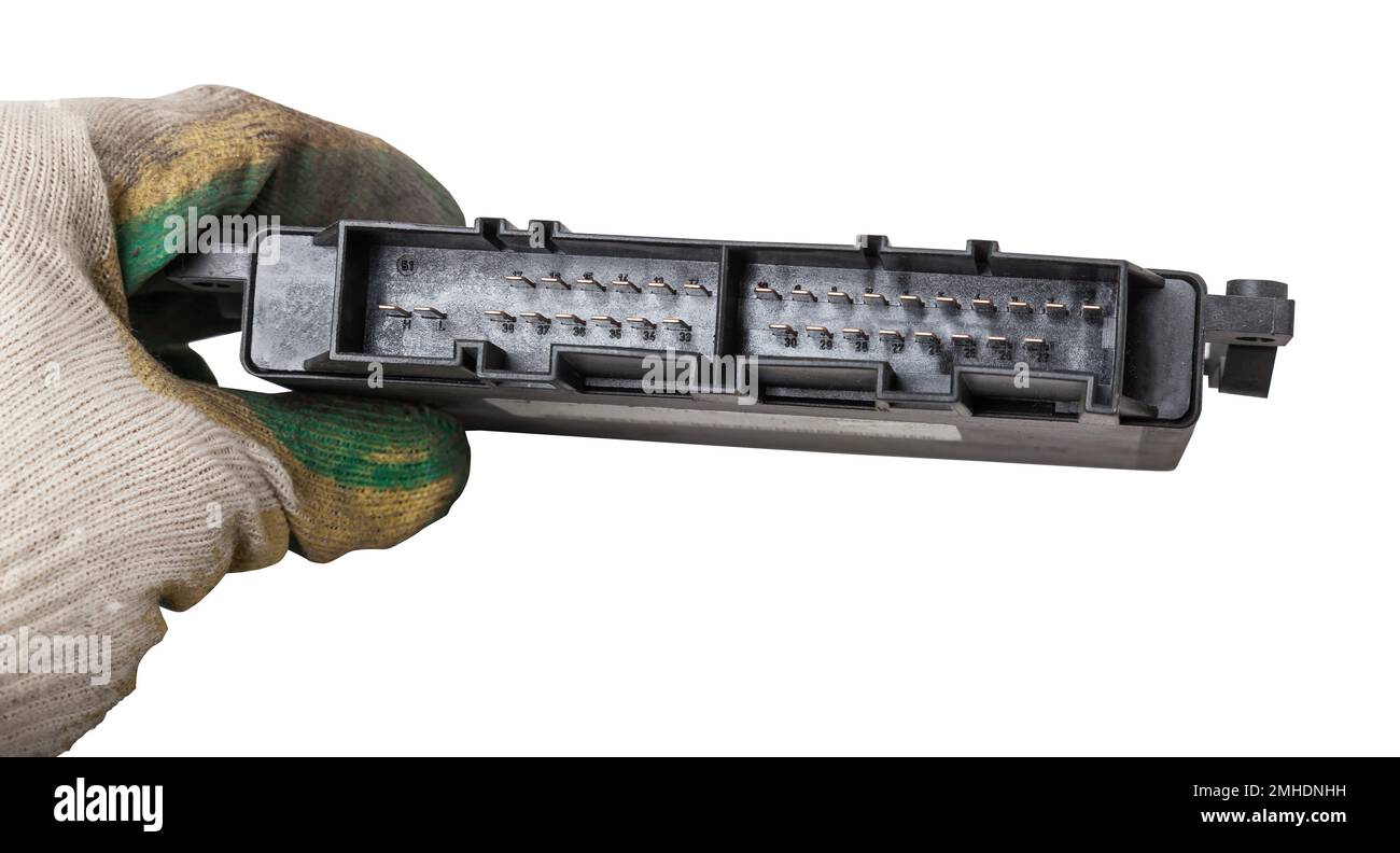 Metall car engine control unit on a white isolated background is the