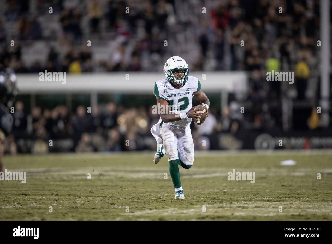South Florida quarterback Jordan McCloud (12) scrambles into open field