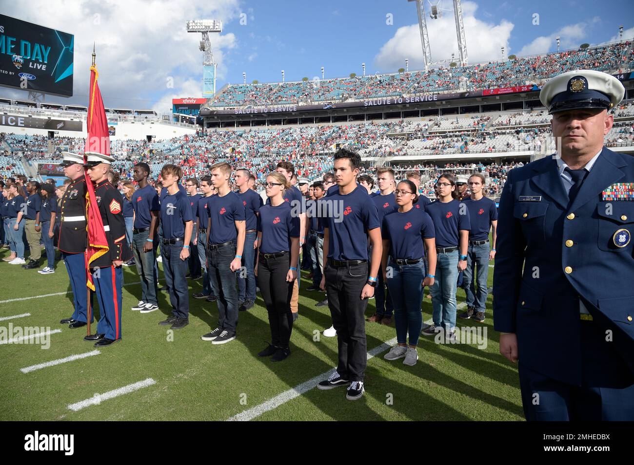 Recruits of all branches of the military take oath of service during  halftime of an NFL football game, Indianapolis Colts vs. Jacksonville  Jaguars in Jacksonville, Fla., Sunday, Dec. 2, 2018. (AP Photo/Gary