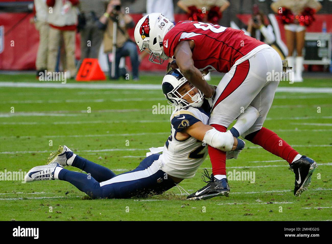 Los Angeles Rams safety Taylor Rapp (24) and Atlanta Falcons place