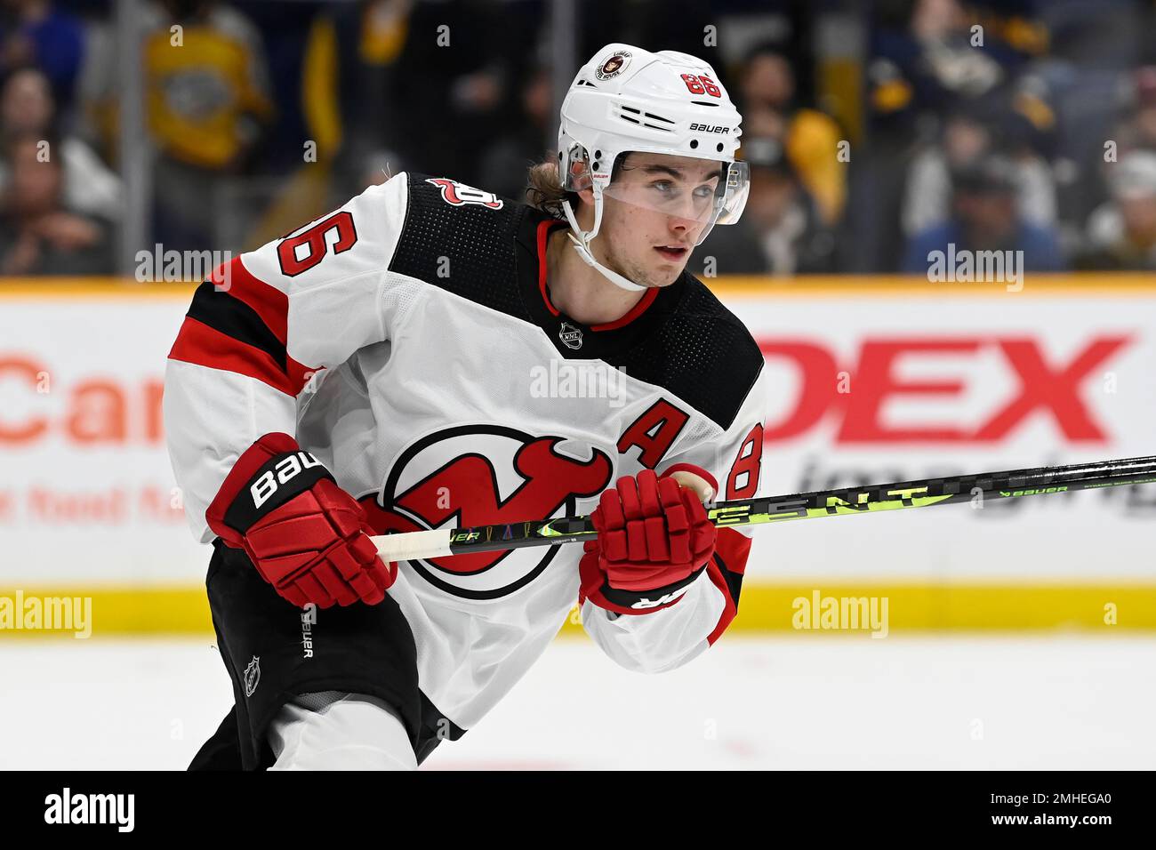 New Jersey Devils center Jack Hughes (86) plays against the Nashville