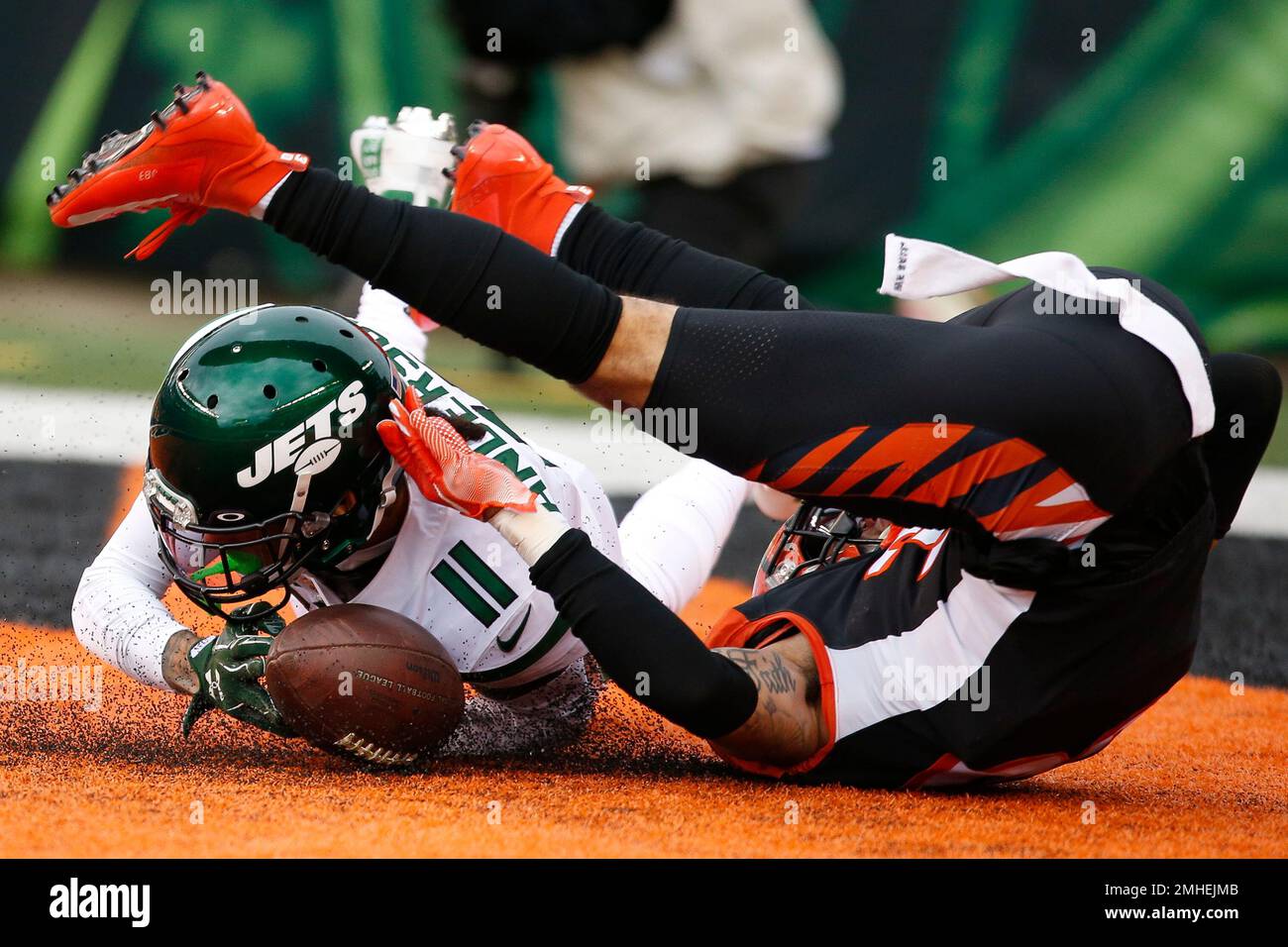Cincinnati Bengals free safety Jessie Bates, right, breaks up a pass to New  York Jets wide receiver Robby Anderson (11) during the first half of an NFL  football game, Sunday, Dec. 1,