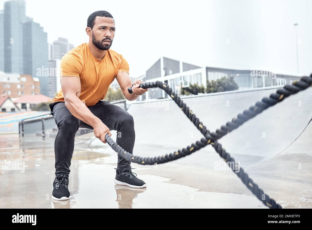 Outdoor, exercise and man with ropes, workout or training for