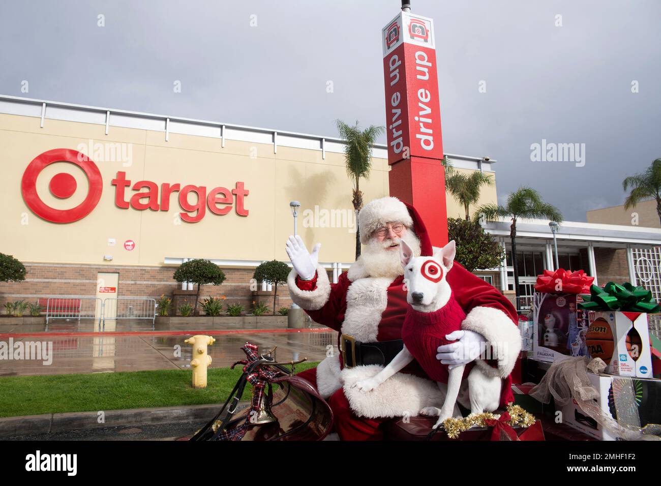 IMAGE DISTRIBUTED FOR TARGET Santa and Bullseye pull up into the