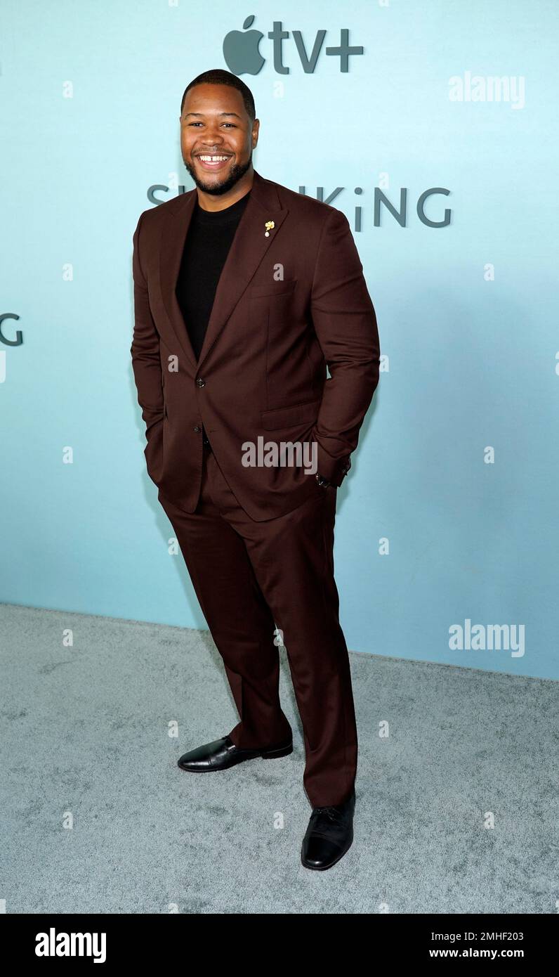 Luke Tennie, a cast member in “Shrinking,” poses at the premiere of the