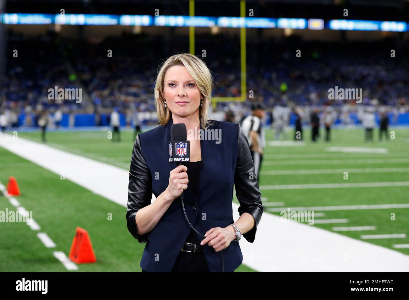 NFL Network reporter Stacey Dales stands on the after during an NFL  football game between the Cleveland Browns and the Chicago Bears, Sunday,  Sept. 26, 2021, in Cleveland. (AP Photo/Kirk Irwin Stock