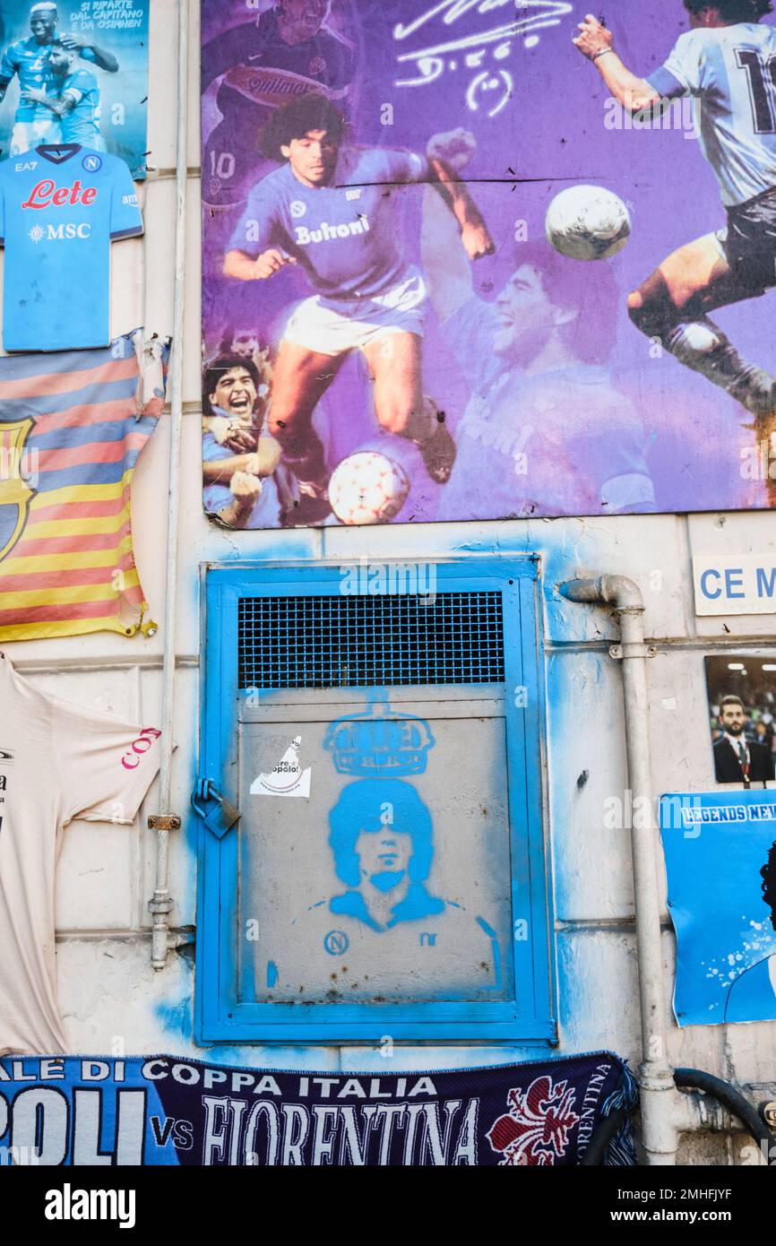 One of the many homemade, makeshift shrines to football, soccer star Diego Maradona. An example of graffiti in Naples, Napoli, Italy, Italia. Stock Photo