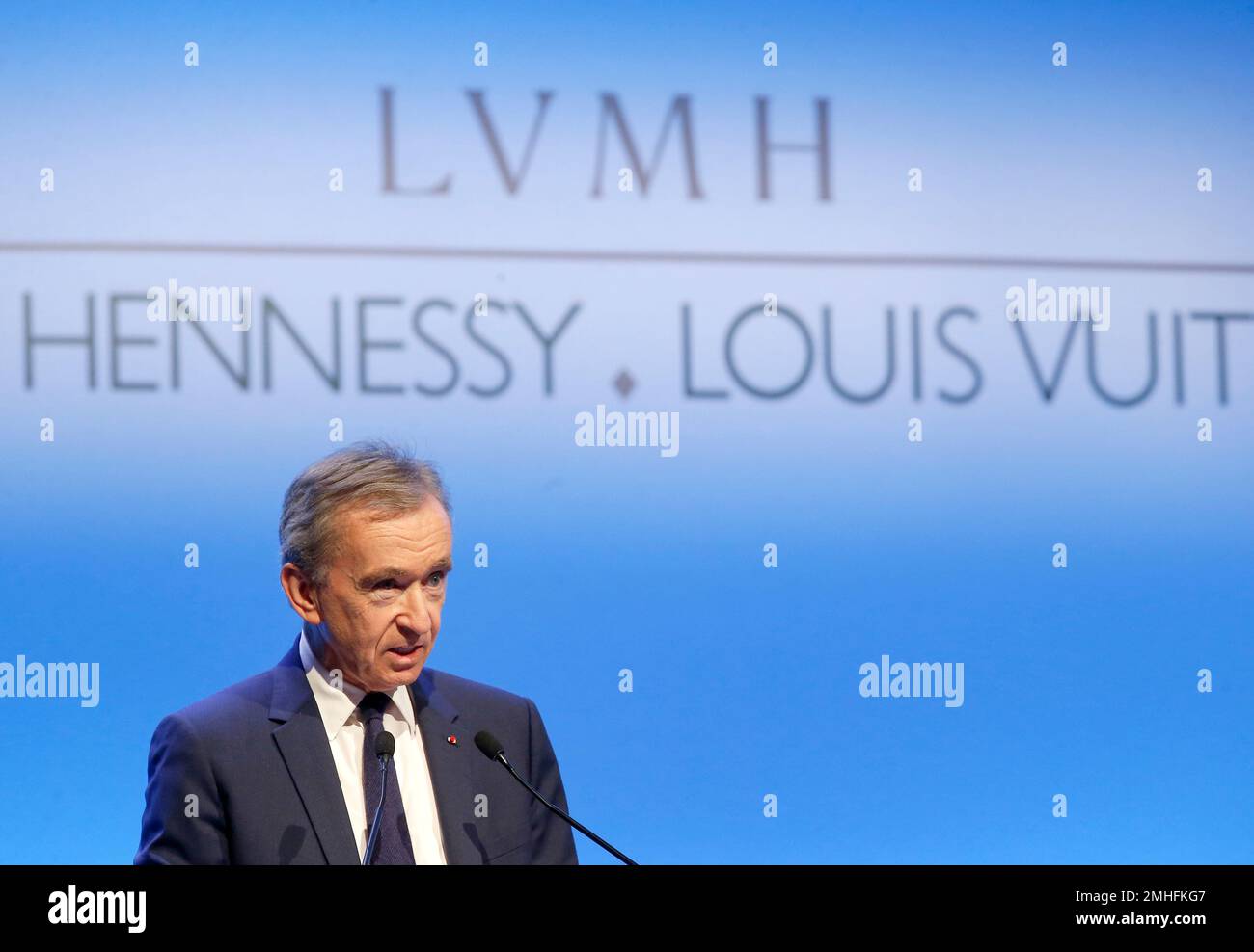 From L) Chairman and CEO of LVMH Bernard Arnault, Hong Kong actress Maggie  Cheung and Dior CEO Sidney Toledano are seen during the opening ceremony o  Stock Photo - Alamy