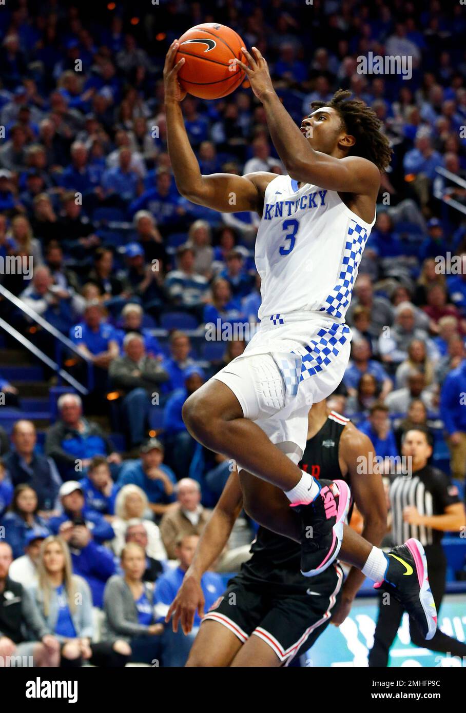 Kentucky's Tyrese Maxey (3) shoots near Lamar's T.J. Atwood during the
