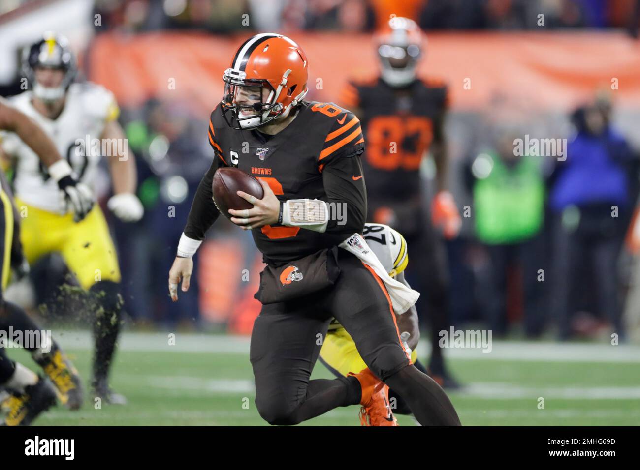 Cleveland Browns quarterback Baker Mayfield (6) scrambles against the  Pittsburgh Steelers during the second half of an NFL football game,  Thursday, Nov. 14, 2019, in Cleveland. (AP Photo/Ron Schwane Stock Photo -  Alamy