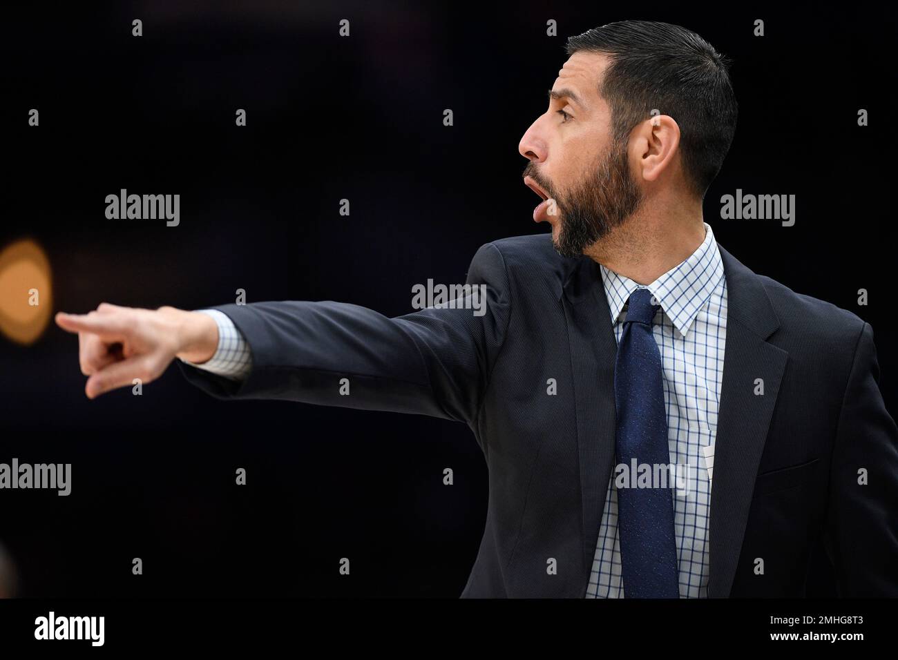 Charlotte Hornets head coach James Borrego points during the first half ...