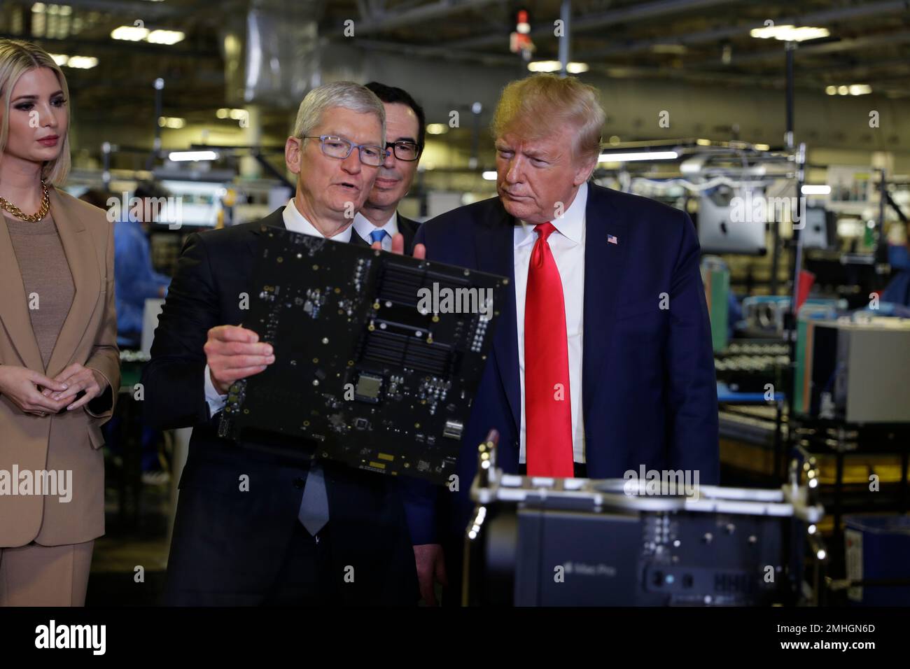 President Donald Trump tours an Apple manufacturing plant, Wednesday