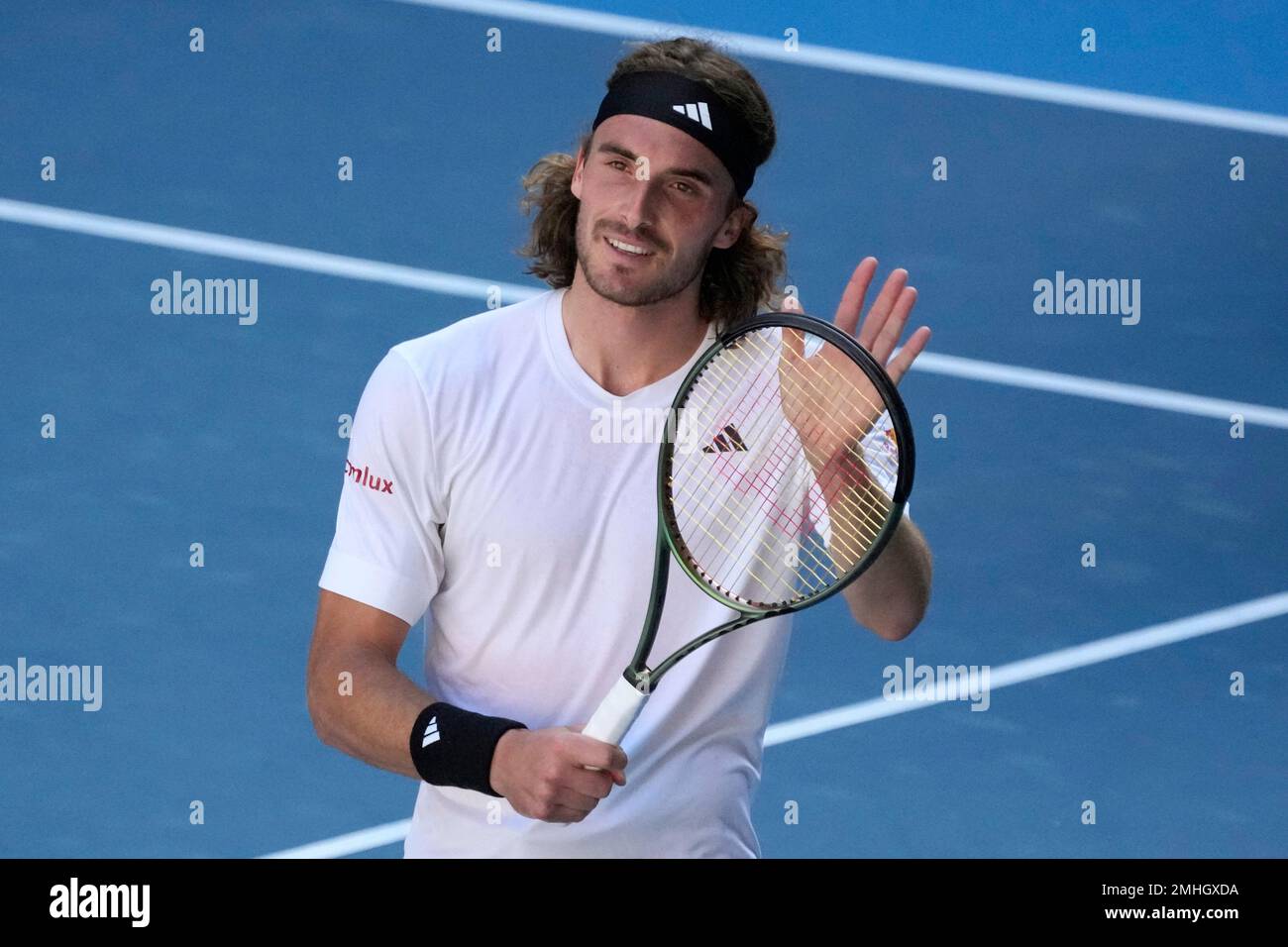 Stefanos Tsitsipas of Greece reacts after defeating Karen Khachanov of Russia in their semifinal at the Australian Open tennis championship in Melbourne, Australia, Friday, Jan