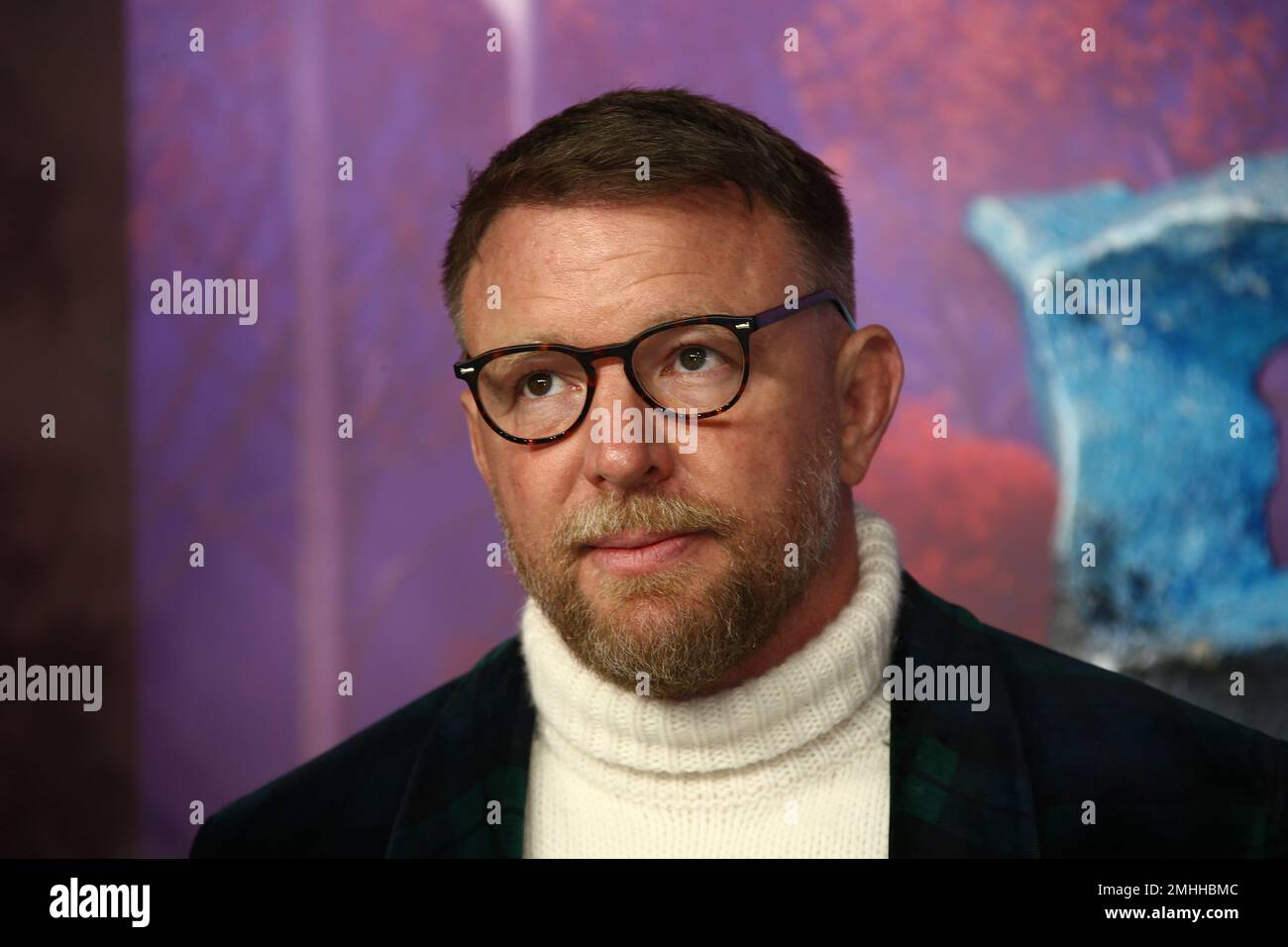Guy Ritchie poses for photographers upon arrival at the European ...