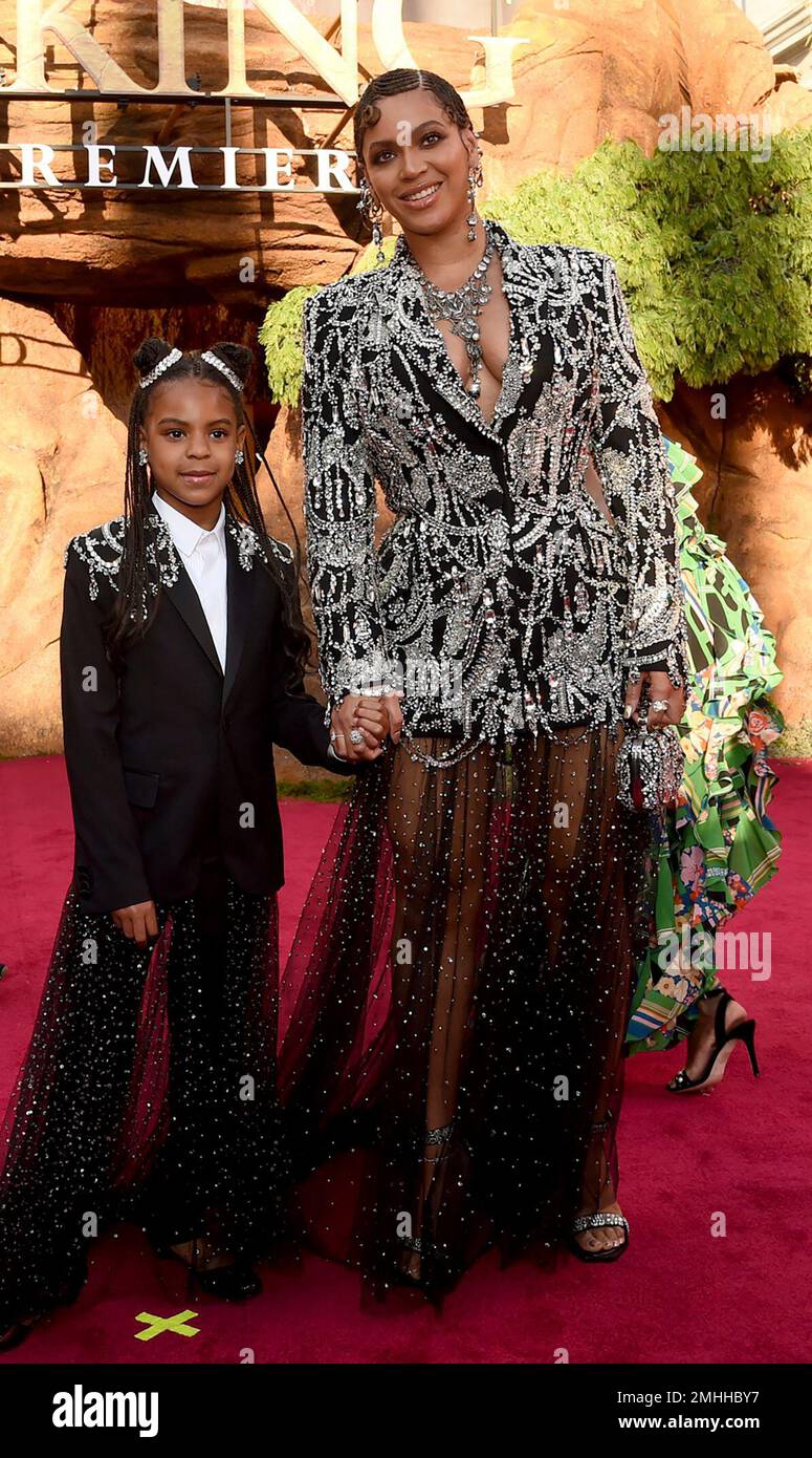 FILE - In this July 9, 2019 file photo, Beyonce, right, and her ...