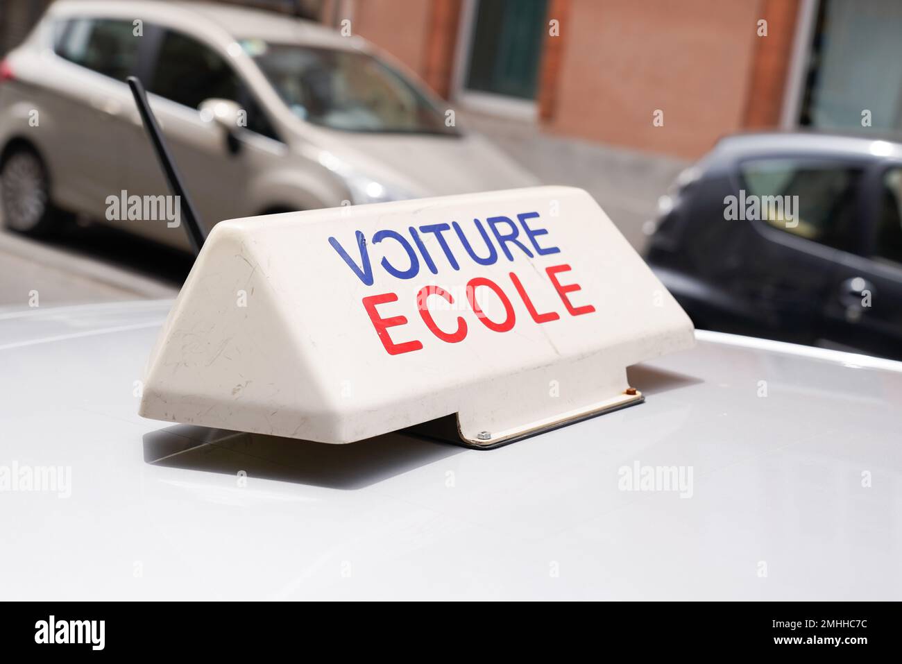 voiture ecole text in french means driving school vehicle panel on the car roof Stock Photo Alamy