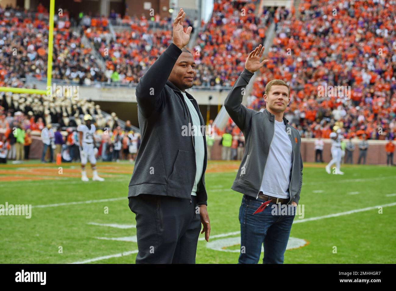 Former Clemson standouts and now current NFL players (l-r) Dexter Lawrence-New York Giants and Adam Humphries-Tennessee Titans, greet the fans during the first half of an NCAA college football game against Wake