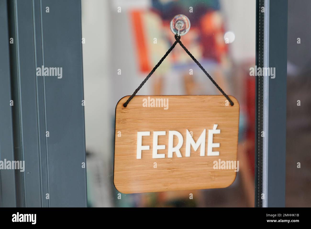 fermé means in french closed boutique on wooden sign board wood on ...